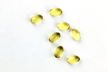 Close up food Supplement oil filled capsules suitable for: fish oil, omega 3, omega 6, omega 9, evening primrose, borage oil, flax seed oil, vitamin A, vitamin D, vitamin D3, vitamin E. High quality