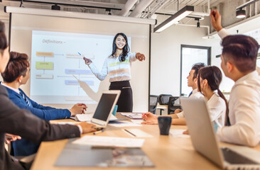 Naklejka premium Business woman making presentation in conference room