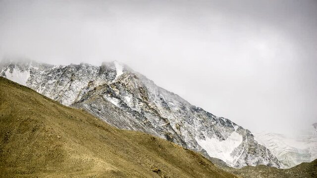 Timelapse snow-covered mountains.