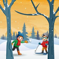 Children having fun at winter forest landscape