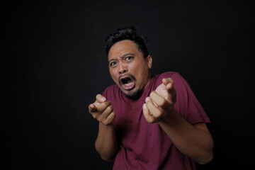 funny frightened man scream in the dark, shocked asian guy with priceless expression