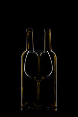 Still life with glass objects on a black background