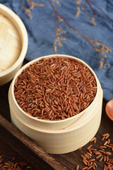 Red Rice on the background of retro Chinese style.