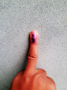 Ink mark on the finger after voting
