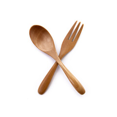 Close up wooden fork and spoon on white