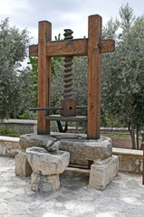 The traditional wooden Olive Press