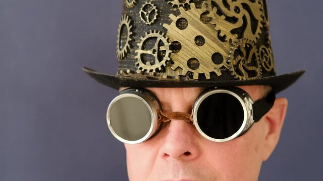 adult elderly man in a hat and black glasses in steampunk style, parapunk, emotions on his face, concept idea, eureka