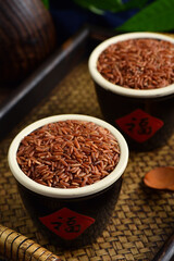 Red Rice on the background of retro Chinese style. The Chinese meaning in the picture is happiness