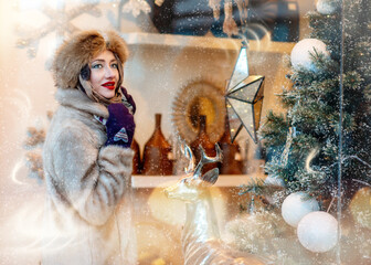 a woman in winter clothes looking at window and shopping