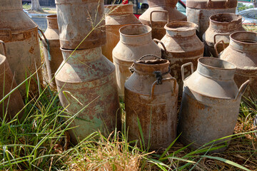 Obraz premium stack of old milk cans