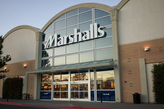 Portland, Oregon, USA - Sep 18, 2019: Marshalls Store in Portland's Cascade Station Shopping Center at dusk. Marshalls is a chain of American off-price department stores owned by TJX Companies.