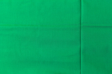Fototapeta premium Abstract green fabric texture background, blank green fabric pattern background