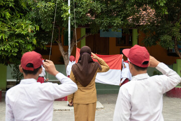 Indonesian Flag honor is performed by all flag ceremony participants in the school