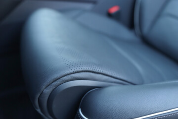 Car interior. The seat is made of genuine leather from a close distance.