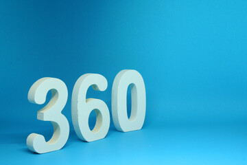 360 ( three hundred sixty ) Isolated Blue Background with Copy Space - Number 360% Percentage or Promotion - Discount or anniversary concept - Angle Degree