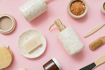 Set of bath accessories on color background