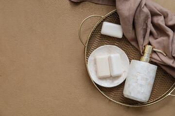 Set of bath accessories on color background