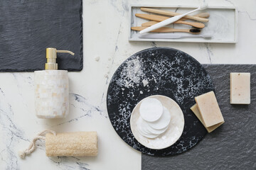 Composition with bath accessories on table