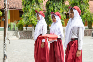 Indonesian flag ceremony performed by indonesian elementary school student in the school