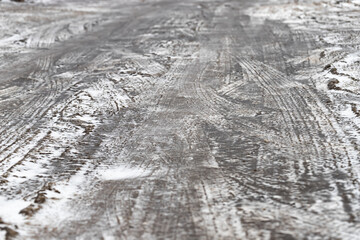Country road in a cottage village after the onset of cold weather