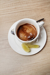 Espresso with lemon. Cafe menu. Gourmet drink.