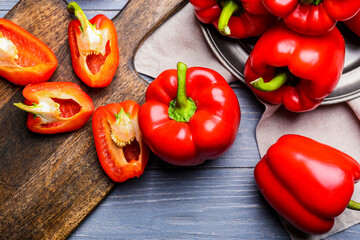 Red bell pepper on wooden table