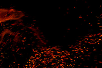 flame of fire with sparks on a black background