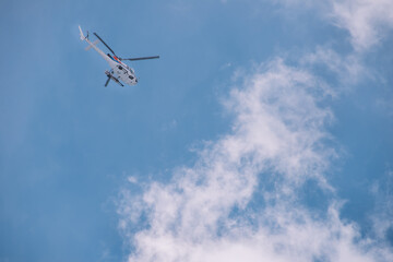 Fototapeta na wymiar Helicopter Clouds And Blue Sky