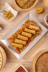 Spring rolls in white dish