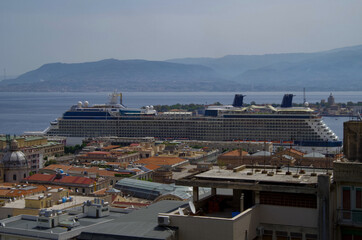 Modern Celebrity cruiseship or cruise ship liner Equinox in port of Messina, Italy on Sicily during...
