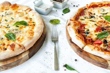 freshly baked pizza on a white tablecloth