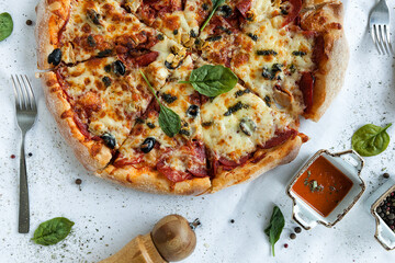 freshly baked pizza on a white tablecloth