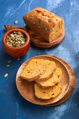 Tasty pumpkin pie on color background