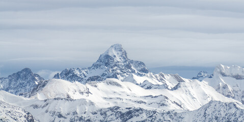 Amazing dramatic Winter panoramic View to the snow covered Mountain Hochvogel in Allgau Alps, Bavaria, Germany.