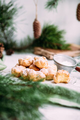Profiteroles with custard on the table. New Year's dessert