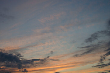 Naklejka na ściany i meble Colorful clouds on sunset on a summer day