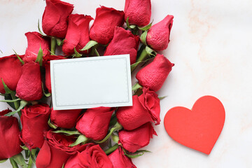 Happy Valentine's Day greeting card. large bouquet of roses and red heart on a white background. space for text