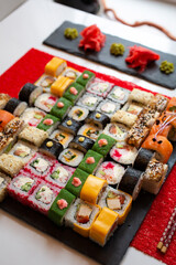Set of sushi from many types of roles and with different stuffing. Sushi menu.
