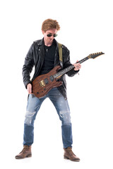 Fototapeta na wymiar Stylish rock musician guitarist in leather jacket holding electric guitar prepare and get ready. Full body length isolated on white background. 