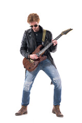 Naklejka premium Macho young stylish man rock musician playing electric guitar solo looking down. Full body length isolated on white background. 