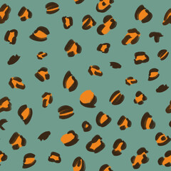 Hand-drawn brown, orange animalistic brindle seamless pattern on blue background. Print, packaging, passport, stationery, cover, wallpaper design. © Kate