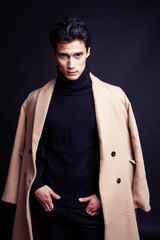 handsome asian fashion looking man posing in studio on black background, lifestyle modern people concept