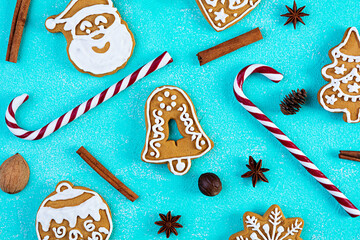 Christmas homemade gingerbread cookies on blue background. Top view