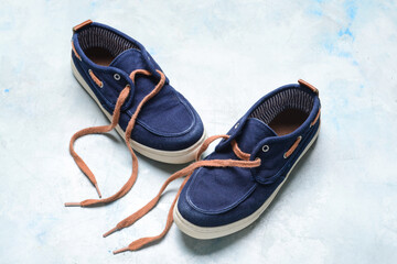 Little boy shoes on light background