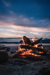 Bonfire is burning against the background of sunset