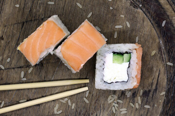 Sushi philadelphia in tempura in bamboo sticks, top view