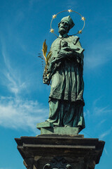 Fototapeta premium The statue of John of Nepomuk Charles Bridge, Prague, Czeche Republic 2017