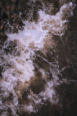 water flowing over rocks