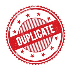 DUPLICATE text written on red grungy round stamp.