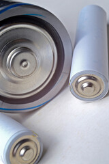 Battery group of different types and sizes on a white background